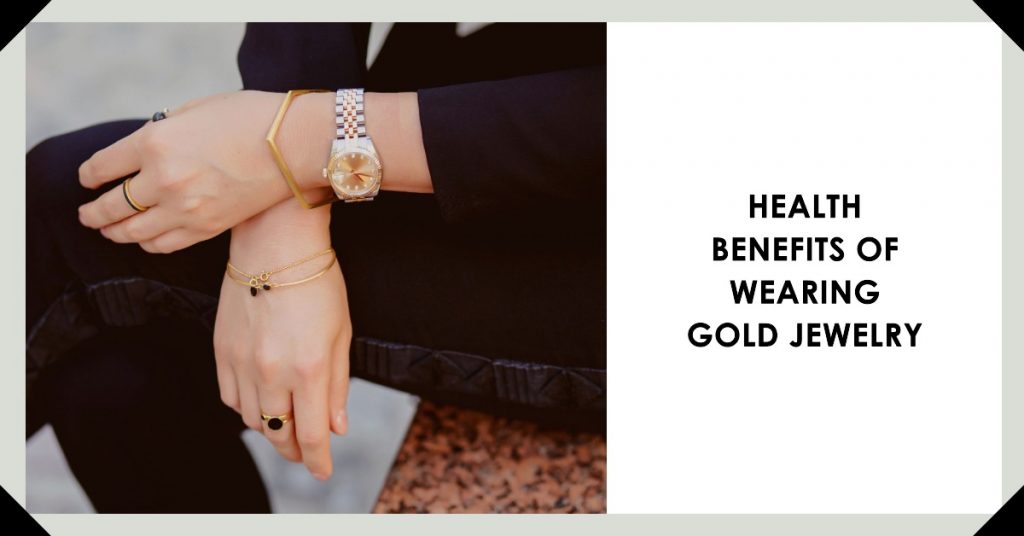 wearing gold jewelry