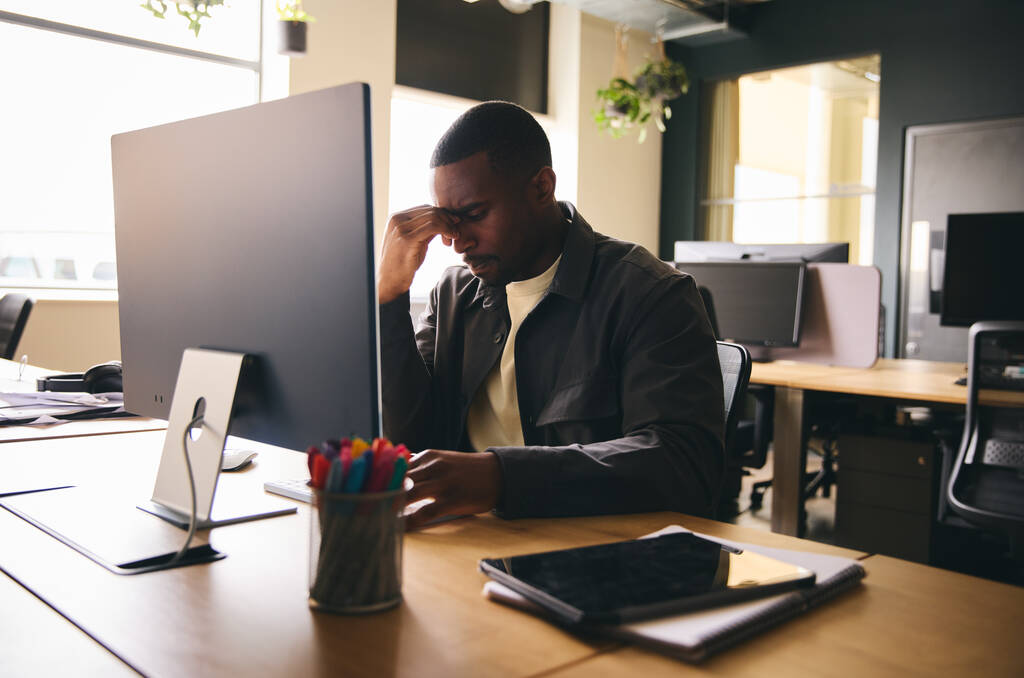 Stressed black businessman